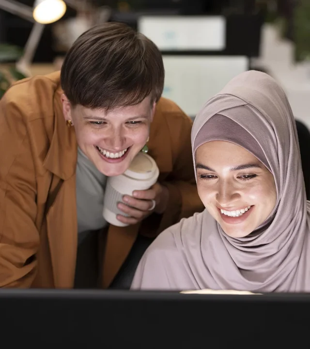 medium shot happy colleagues working together